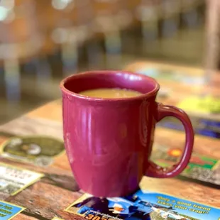 a cup of coffee on a table