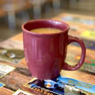 a cup of coffee on a table