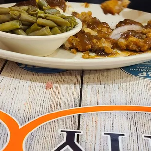 Chicken fried steak, mashed potatoes and green beans