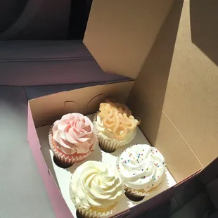 Strawberry, cinnamon funnel cake, lemon, and birthday cake flavored cupcakes.