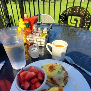 Classic Eggs Benedict. Substituted fruit and added Avocado. Best breakfast view in town.