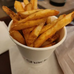 french fries in a paper cup