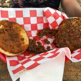 Letting it cool off.  Dry hot, cheese melted and most of the chili under the bun. Once cooked, reassembled.