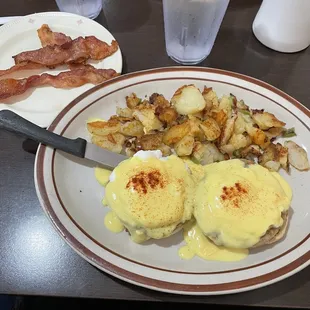 Eggs Benedict with sausage