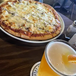 Hamburger, cream cheese and onion Pizza. And. blue Moon .