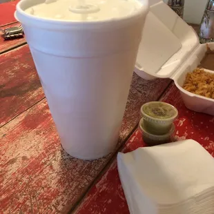 a cup of hot chocolate and a bowl of cereal