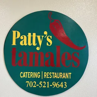 a sign for patty's tamales