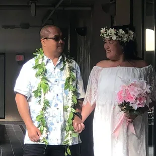 The maile lei with pikake on my husband, and my haku lei on me