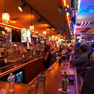 people sitting at a bar