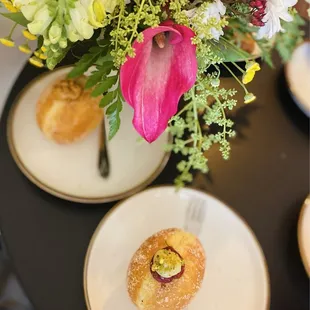 Raspberry pistachio bomboloni.