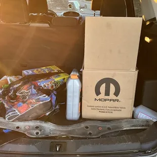 Engine parts in a box in the trunk