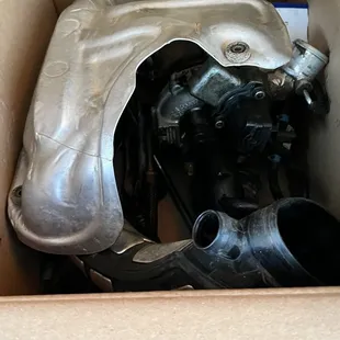 Taken apart engine pieces just left in the trunk