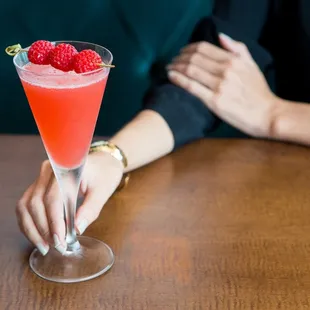 Raspberry Martini with house-infused vodka and muddled raspberries