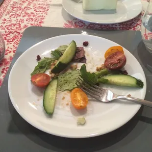 Delicious garden salad with cucumbers, cherry tomatoes, walnuts, blue cheese