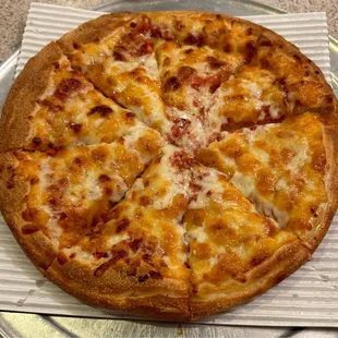 Plain Pizza (Small) - New England/Greek style.  Although there's a lot of cheese the sauce is in there and was tasty.  Good pizza