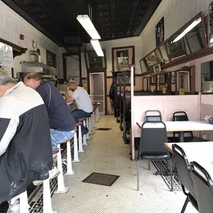 iners sitting at tables