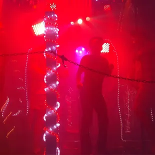 a man and a woman dancing on stage