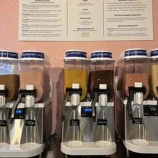 a row of coffee machines