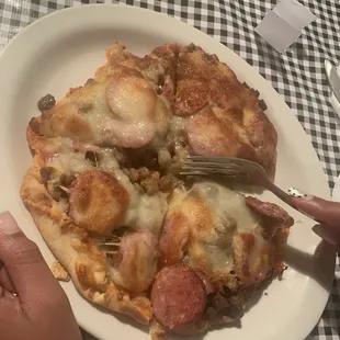 Individual sausage pizza.