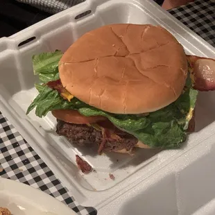 1lb bacon cheeseburger served with fries. This is a large to go container!!