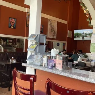 a man and a woman at the counter