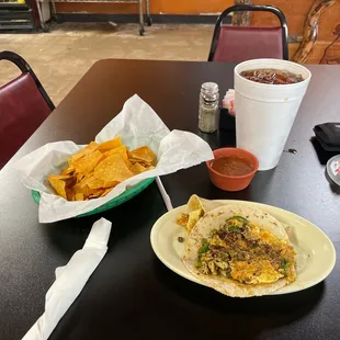 Chorizo con huevo with chopped jalapeño breakfast tacos.