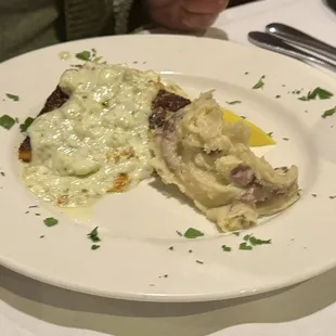 Blackened salmon with blue cheese glaze and mashed potatoes