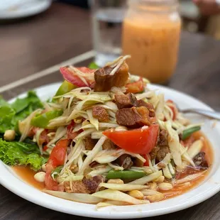 Signature Papaya Salad with crispy pork belly Thai style