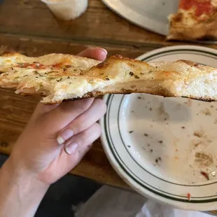missing sauce under cheese.