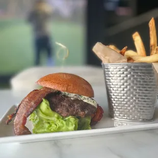 The S.O.S (sweet on savory) burger is my favorite! Pepper candied bacon, walnut aioli, lettuce, and herbed cheese spread.  So Good!
