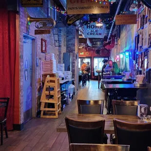 a restaurant with tables and chairs