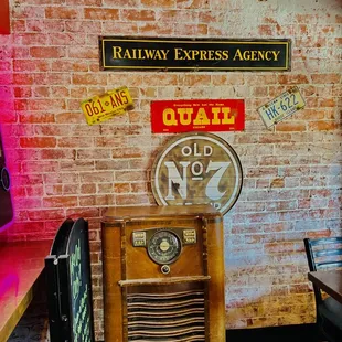 an old radio and neon signs
