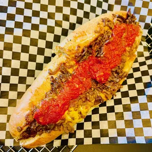 Italian - peppers, onions, garlic marinara, provolone, sharp American