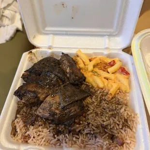 Jerk chicken, rice &amp; peas and macaroni &amp; cheese.