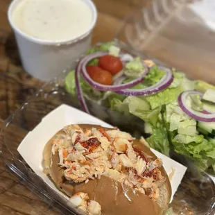 Hot buttered lobster roll with a side salad. Plus 12 oz cup of clam chowder