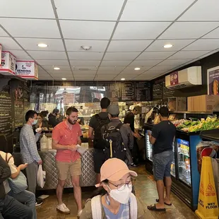 a crowd of people in a restaurant