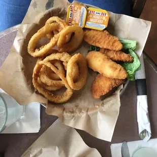 Chicken fingers and onion rings.