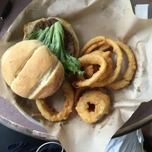 Hamburger and onion rings.  Came with lettuce, onion and a slice of tomato.