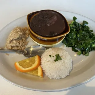 How is Feijoada $19?!?! Its beans and rice with one piece of spare rib