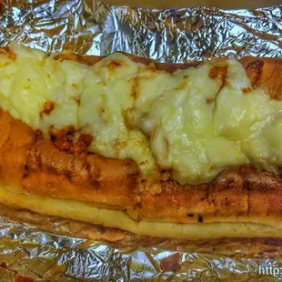 a cheesy bread with cheese