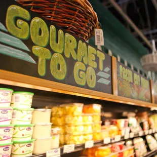 a display of fruit and yogurt