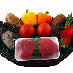 a basket of meat and vegetables