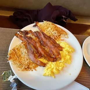 Cheese omelette with a lot of bacon.