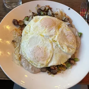 Country skillet with a lot to love, but all that stuff on top of the hashbrowns made the hashbrowns soggy.