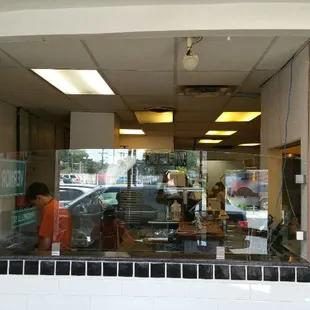 Open kitchen,  so you can see your pizza made best!