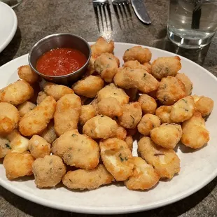 a plate of fried tater tots