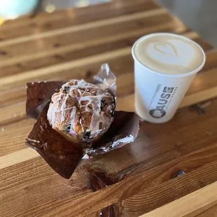a donut and a cup of coffee