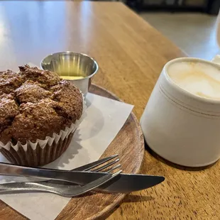 Vanilla cappuccino with a warmed muffin