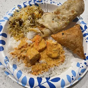 Biriyani Chicken 65, chicken tikka masala, a samosa and garlic naan