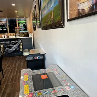 Street fighter in the foreground, menu and coffee bar in the background